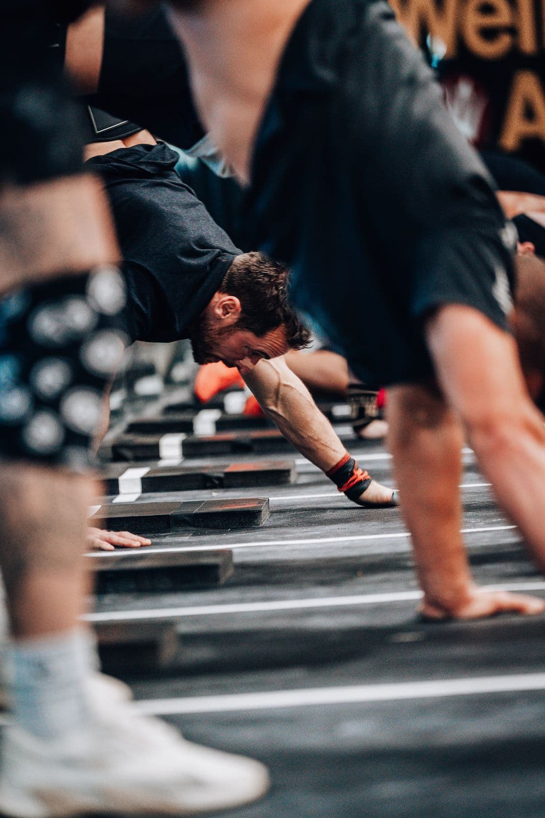 Athlete moving through a burpee