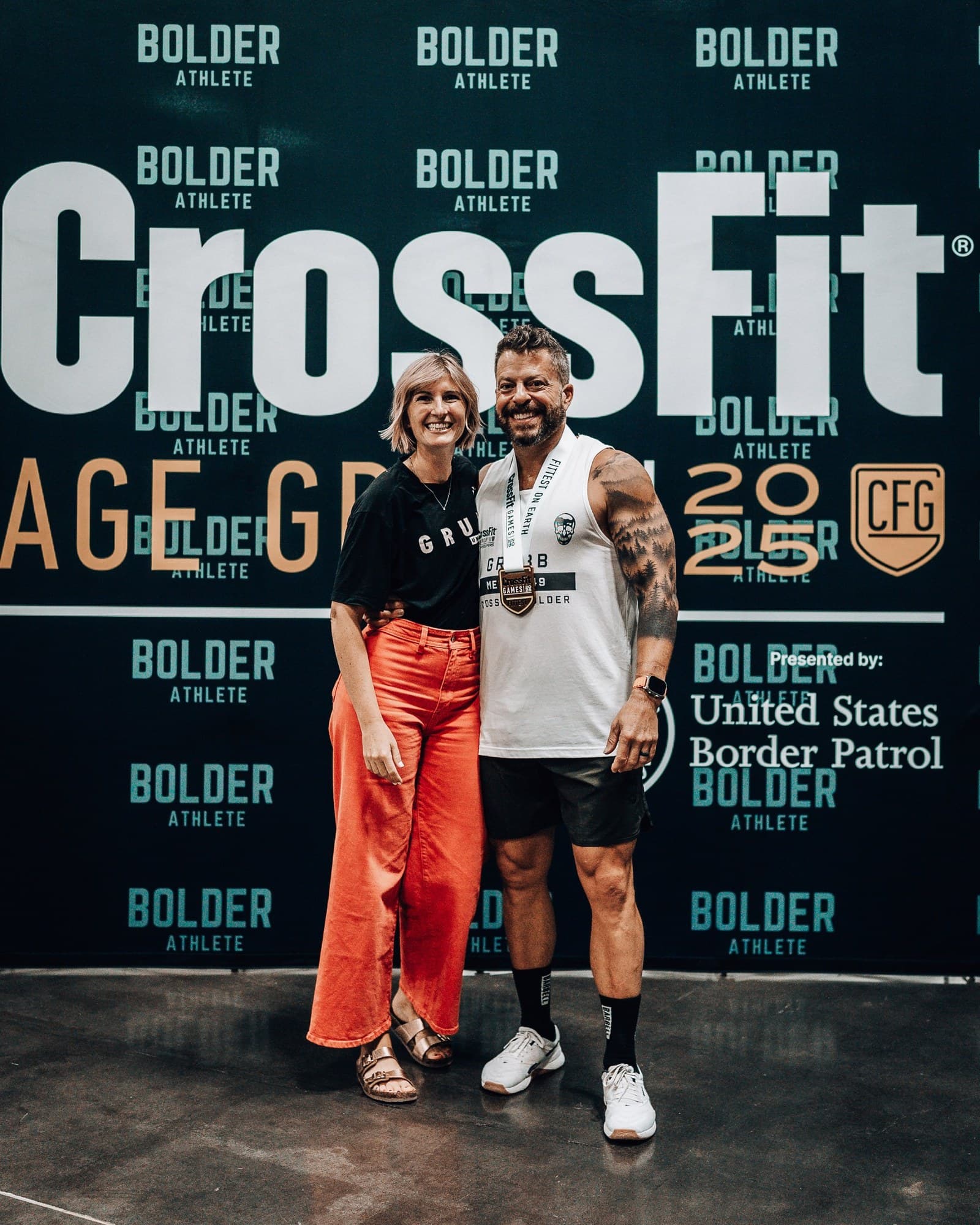 Jason Grubb with his wife, Gina, at the 2025 CrossFit Games